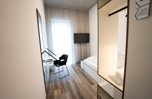 Schlußlberg Hotel | Comfortable Motel Schlafraum with Pool and Pet-Friendly Options