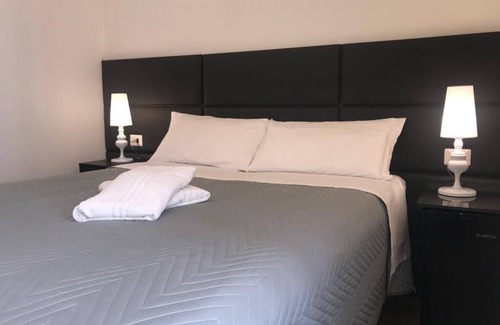 Motta Sant'Anastasia House | Cozy Motta Palace Apartments with Family-Friendly Amenities