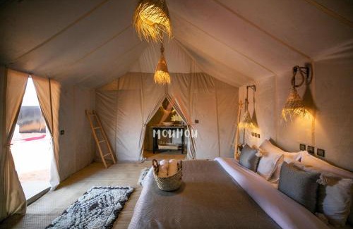Taouz Hotel | Experience Elegance at Mouhou Desert Camp: 5-Star Oasis