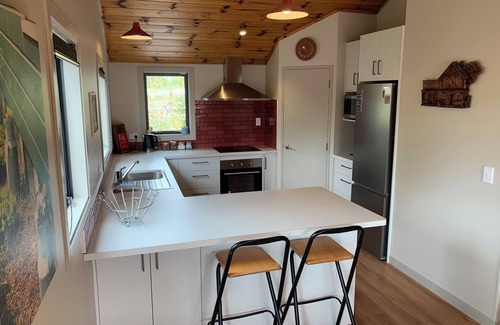 Ohakune House | Scenic Mountain House with Ocean Views & Family-Friendly Amenities