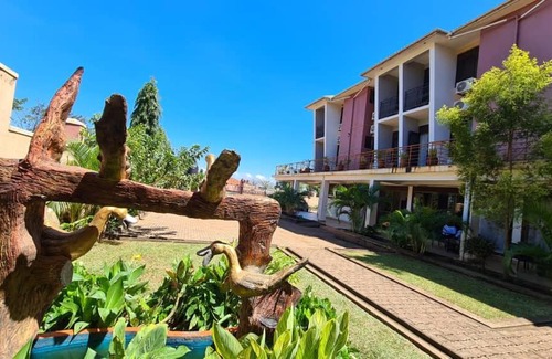 Mbale Hotel | Relax at Mountain Inn Hotel - 4-Star Comfort & Pool Access