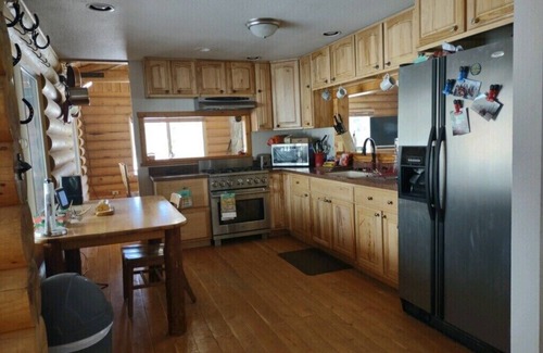Golden Valley County Cabin | Inviting Mountain Log Cabin with Horse Barn & Fenced Paddocks