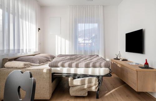 Valdaora di Mezzo Apartment | Guest Rated 9.4: Mountain Meadows Apt 2 with Family Amenities