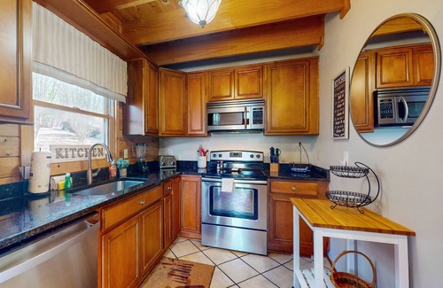 Cherry Log Cabin | Inviting Mountain View Cabin with Hot Tub and Game Tables