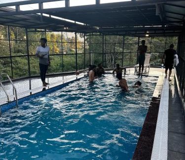 Kunnathidavaka House | Scenic Mountain View: Family-Friendly Getaway Awaits