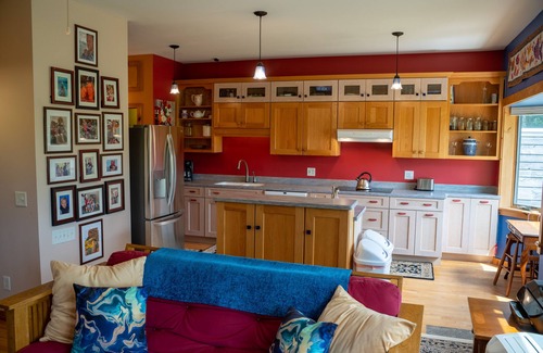 Ithaca House | Inviting Ecovillage with Ocean View & Jacuzzi Retreat