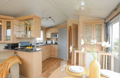 Caergeiliog Cottage | Mountain View Lodge: Pet Friendly Getaway with Garden Oasis