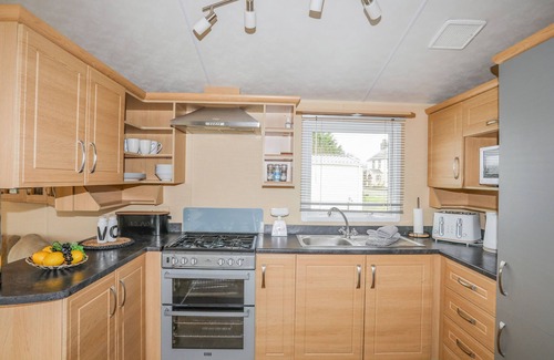 Caergeiliog Cottage | Mountain View Lodge: Pet Friendly Getaway with Garden Oasis