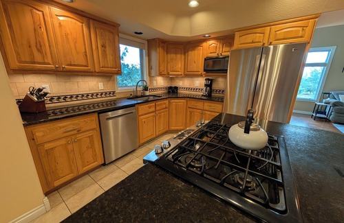 Missoula House | Mountain Views with Expansive Deck Luxury 4BR Home. nNear Downtown and Airport
