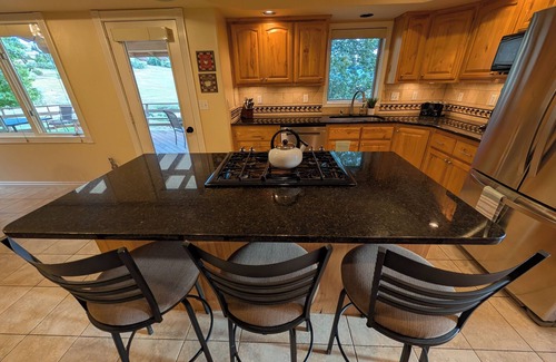 Missoula House | Mountain Views with Expansive Deck Luxury 4BR Home. nNear Downtown and Airport