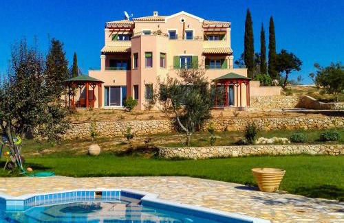 Limni Apartment | Pet-Friendly Mouse House with Oceanfront Pool & Kid's Fun