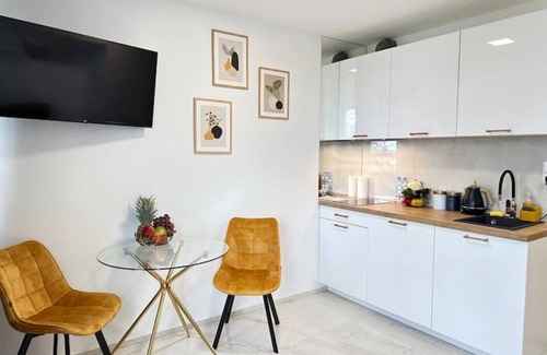 Psie Pole Apartment | Discover Moveen! Modern Urban Hideaway for Families