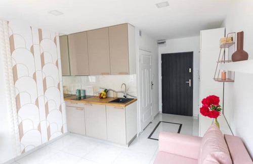 Psie Pole Apartment | Chic Studio Retreat Ideal for Families in Peaceful Location