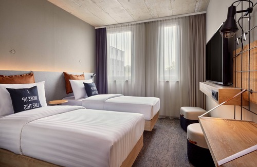 Heide Hotel | Discover Moxy Karlsruhe: Family-Friendly & Wheelchair Accessible