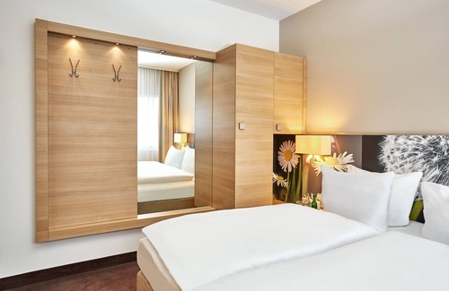 District 9 Hotel | Discover H+ Hotel Zürich: A 4-Star Retreat with Spa & Dining