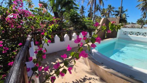 Pwani Mchangani Apartment | Top Floor Oceanfront Apartment with Pool & Beach Access