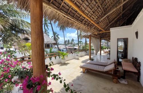 Pwani Mchangani Apartment | Top Floor Oceanfront Apartment with Pool & Beach Access