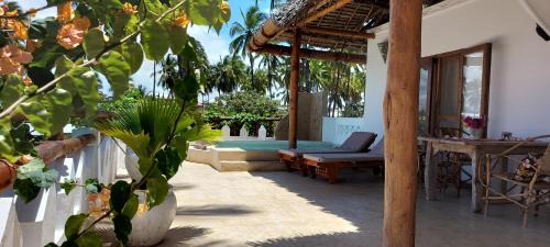 Pwani Mchangani Apartment | Top Floor Oceanfront Apartment with Pool & Beach Access