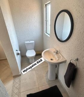 Elias Motsoaledi Bed & Breakfast | Cozy Mphagahle B&B: Poolside Retreat with Breakfast Included