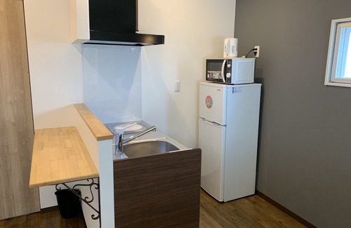 Tomigusuku Apartment | Family-Friendly Stay at Mr.KINJO in Tomigusuku
