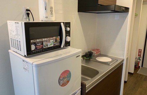 Tomigusuku Apartment | Family-Friendly Stay at Mr.KINJO in Tomigusuku