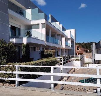 Cannigione Apartment | Oceanfront Getaway at MT Consulting Vacanze: Ranked 9/10