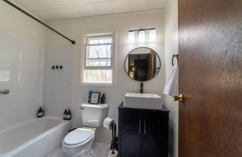 Cheboygan House | Unwind at Mud Creek Cottage: Pet-Friendly Retreat Awaits