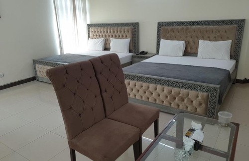 E-11 Sector House | Inviting Mudan Regency Guest House with Family-Friendly Perks