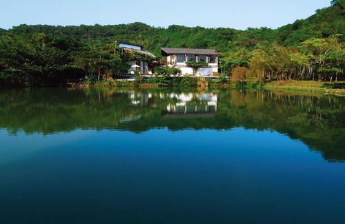 Mudan Hotel | Relax at Mudanwan Villa: 4-Star Retreat with Pool & Breakfast
