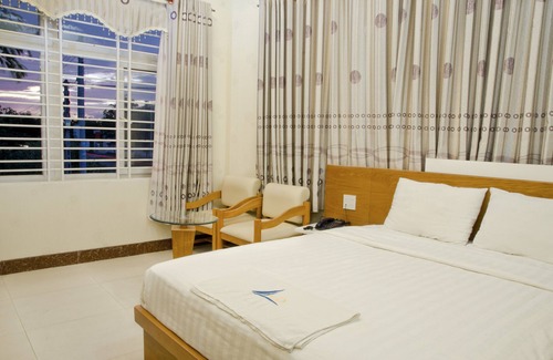 Tuy Phong Hotel | Discover Mui Tau Hotel: Family-Friendly Stay with Kitchen
