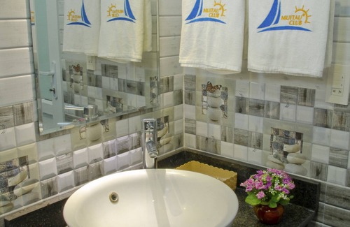 Tuy Phong Hotel | Discover Mui Tau Hotel: Family-Friendly Stay with Kitchen