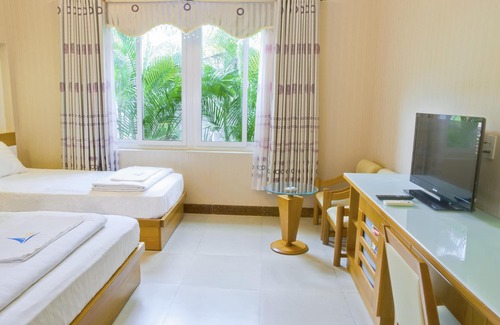 Tuy Phong Hotel | Discover Mui Tau Hotel: Family-Friendly Stay with Kitchen