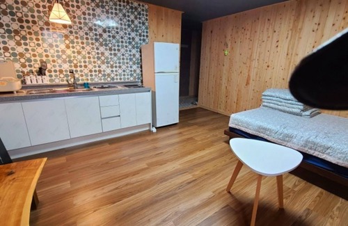 Seolcheon-myeon House | Eco-Friendly Muju Windmills and Streams Pension Awaits You