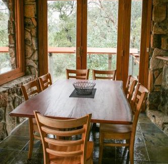 Warrabah House | Muluerindie: Stylish Retreat with Hot Tub & Kitchen Access