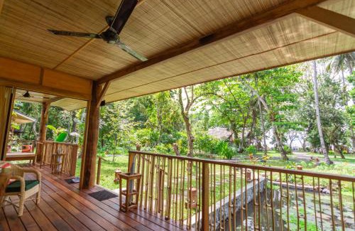 Pineleng Hotel | Discover Murex Dive Resort: Oceanfront Bliss Awaits You