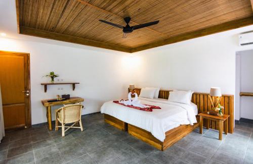 Pineleng Hotel | Discover Murex Dive Resort: Oceanfront Bliss Awaits You