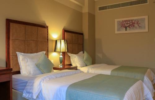 Al Ghubrah Ash Shamaliyyah Hotel | Discover Comfort at Muscat Inn Hotel with Breakfast & Accessibility