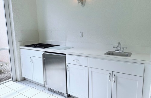Naples Condo | Discover Falling Waters: Premier Pool & Spa Experience