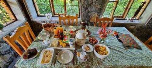 Western Region House | Inviting Mutolere Coffee Pot Guest Houses with Fireplace & Dining