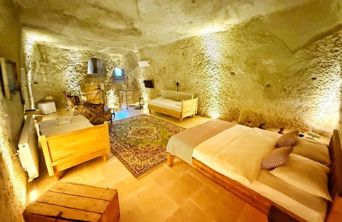 Nar Hotel | Cozy My Cave Suites: Spa Bliss & Family Amenities Await!