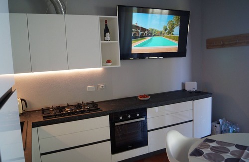 San Benedetto di Lugana Apartment | Experience My Sirmione Beach Apartment with Ocean Views