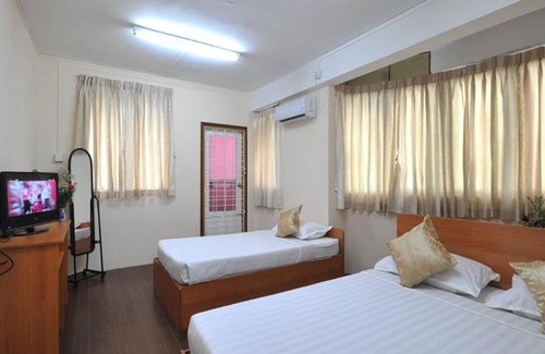 Yangon House | Discover Myint Myat Guest House: Family-Friendly Comfort