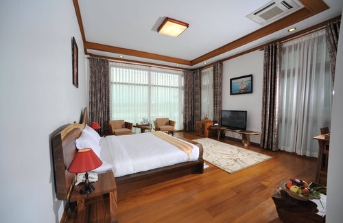 Myitkyina Hotel | Relaxing Myitkyina Palm Spring Resort with Pool & Dining