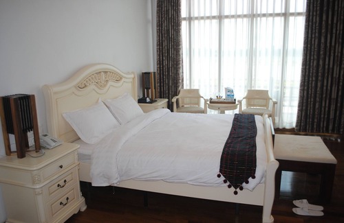 Myitkyina Hotel | Relaxing Myitkyina Palm Spring Resort with Pool & Dining