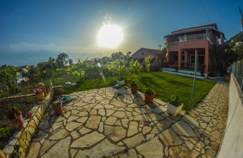 Agios Gordios Apartment | Cozy Myriam's House: 4-Star Oceanfront Retreat