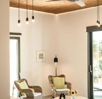 Tersanas Villa | Experience Myrtia Beach House with Oceanfront Views