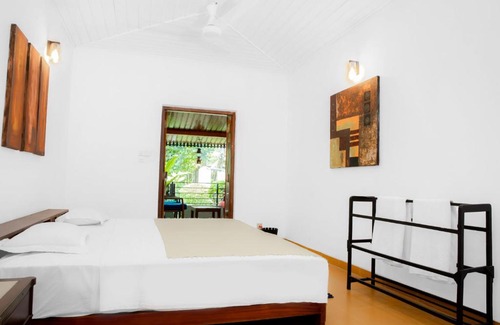 Panadura Bed & Breakfast | Relaxing Mystic Riverfront Bungalow with Pool & Pet-Friendly