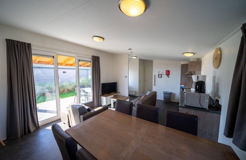 Municipality of Hellevoetsluis House | Cozy Chalet with 3 Bedrooms and Full Kitchen Amenities