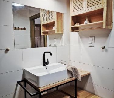Piecki Apartment | Unforgettable Stays at Na Przypiecku with Hot Tub & Dining