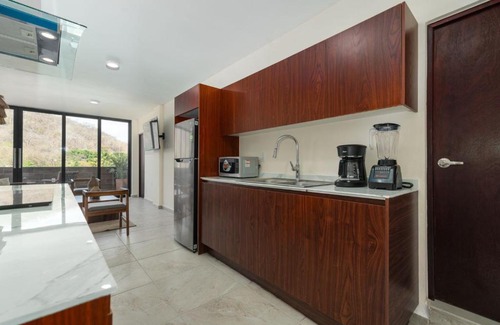 Santa Maria Huatulco Apartment | Experience Oceanfront Bliss at Nabani T1 Condominios